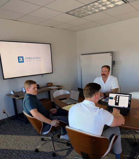 Professionals from Jones & Koch Law Firm